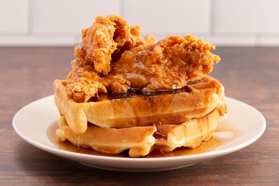 Food vendor Aramark has apologized after serving middle school students in Nyack, New York chicken and waffles with a watermelon dessert on the first day of Black History Month. (Adobe Stock)