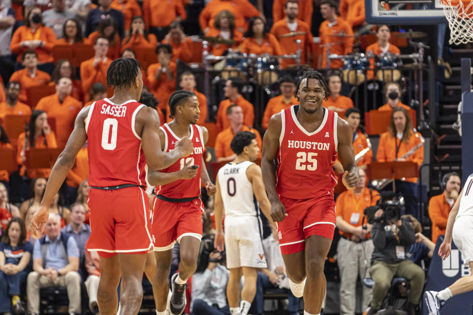 Houston forward Jarace Walker (25) smiles during the second half of an NCAA college basketball game against Virginia in Charlottesville, Va., Saturday, Dec. 17, 2022. (AP Photo/Erin Edgerton)