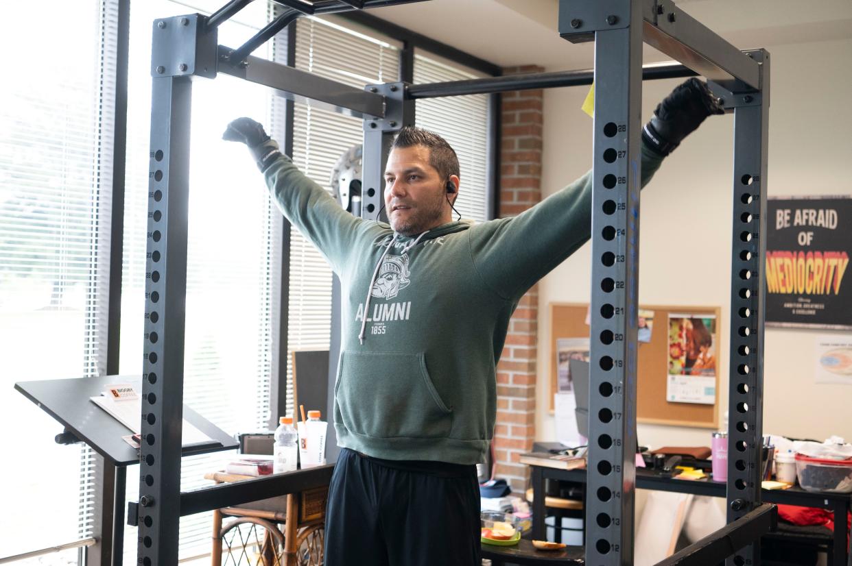 Charles Solano, owner of the five Biggby Coffee shops in the Battle Creek area, started at 7 a.m. on Friday at his Biggby Coffee location on Hill Brady Road, looking to break the world record for most chin ups in a 12-hour period, which is 4,649.
