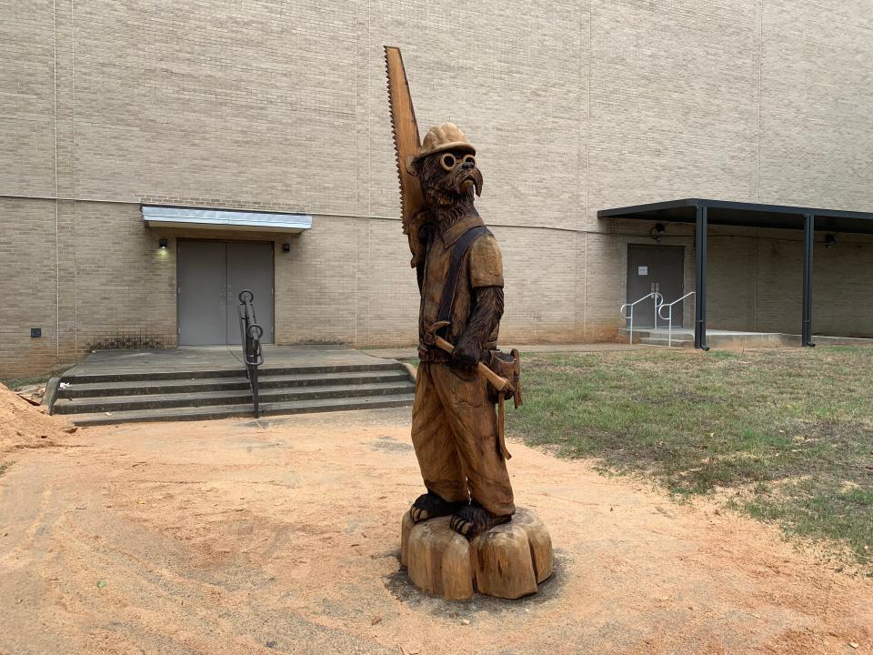 The finished construction worker bear sits outside Thalia Mara Hall in Jackson waiting to be taken to Rolling Fork. Dayton Scoggins carved the statue for the 2023 Great Delta Bear Affair.
