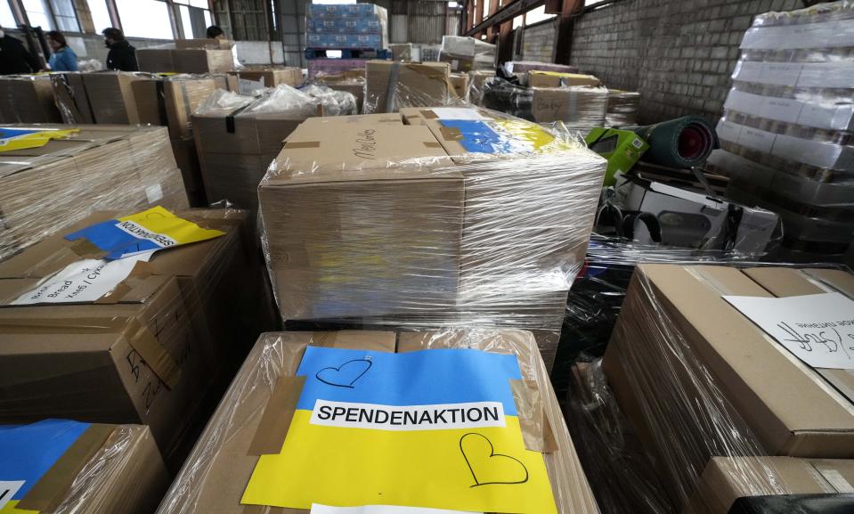 Donated relief supplies for Ukraine are stored before they are loaded to trailers in Cologne, Germany, Thursday, March 31, 2022. After Kyiv mayor Vitali Klitschko contacted Cologne mayor Henriette Reker, 120 pallets with groceries and necessities were collected and send to Ukraine today. (AP Photo/Martin Meissner)