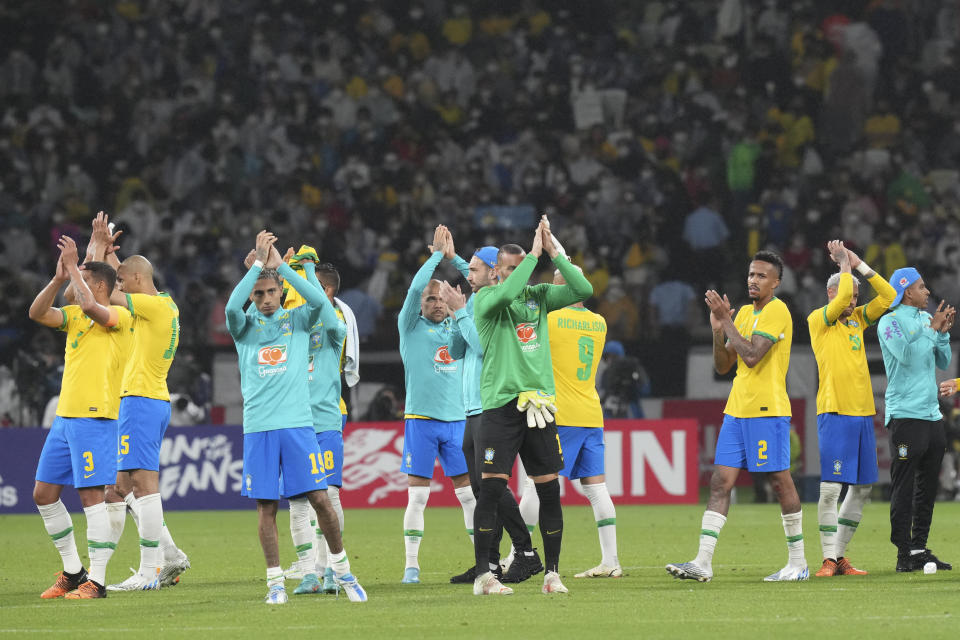 Brazil soccer team celebrates after a friendly match with Japan's team at the National Stadium in Tokyo Monday, June 6, 2022. (AP Photo/Eugene Hoshiko)