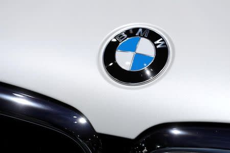 A car with the BMW logo badge is seen on display at the North American International Auto Show in Detroit, Michigan, U.S., January 16, 2018. REUTERS/Jonathan Ernst