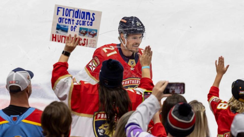 Fans cheer as Florida Panthers center Nick Cousins (21) participates in the warmup period before the start of his Game 4 of the NHL Stanley Cup Eastern Conference finals series against the Carolina Hurricanes at the FLA Live Arena on Wednesday, May 24, 2023 in Sunrise, Fla.