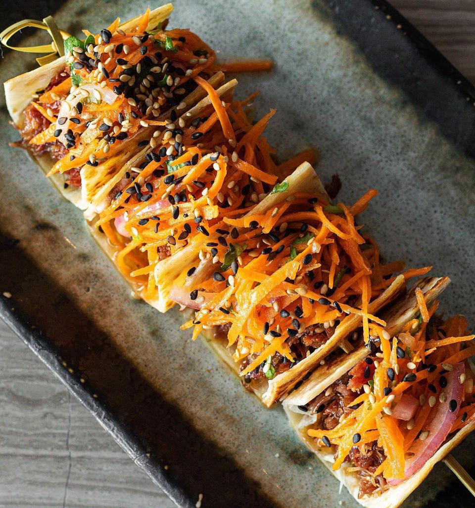 Peking duck tacos are popular at Imoto, the Japanese-inspired spot that's Buccan Palm Beach's "little sister" restaurant.