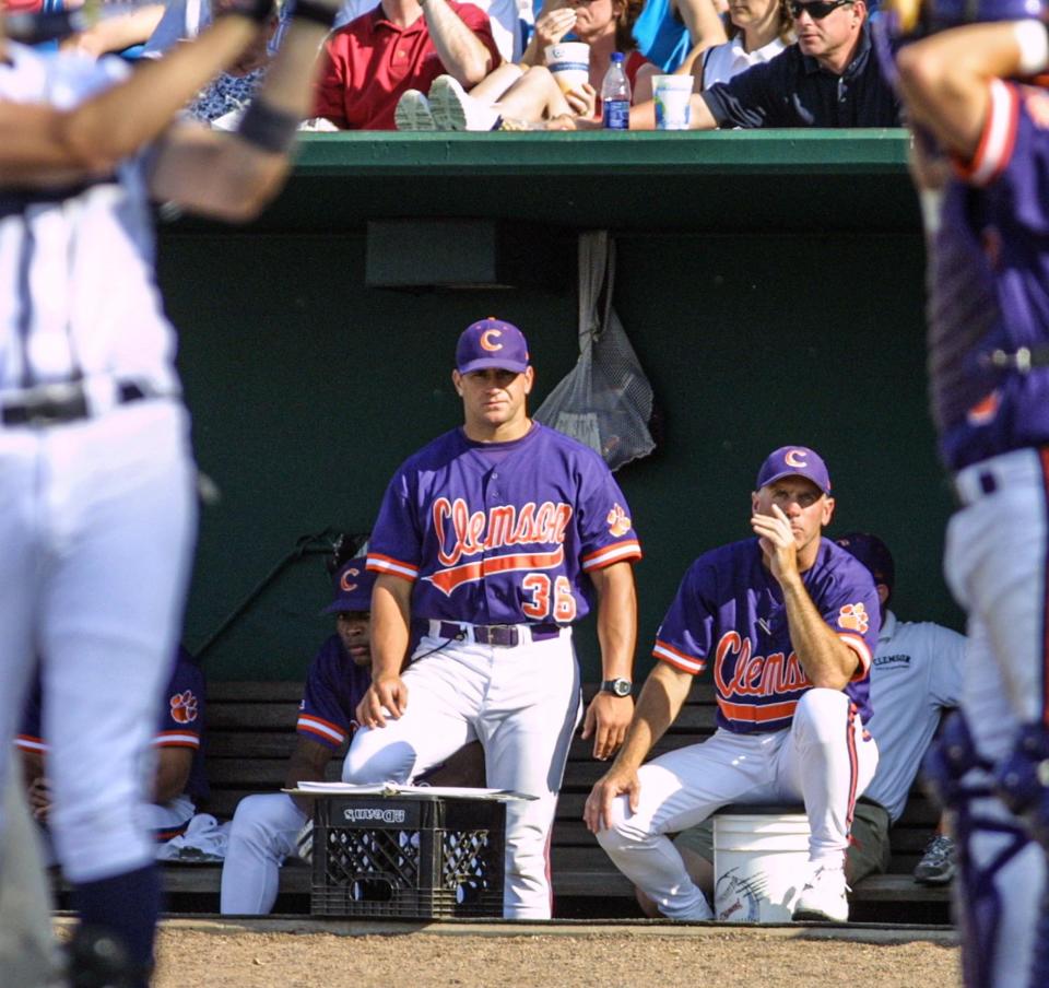 Erik Bakich, left, a volunteer assistant, stands with head coach Jack Leggett during a game with Georgia Tech in 2002.