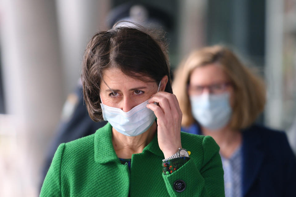 New South Wales Premier Gladys Berejiklian prepares to address a press conference in Sydney, Thursday, June 24, 2021. Berejiklian says Sydney is going through one the "scariest" times of the pandemic as a cluster of the highly-contagious Delta variant continues to spread. (Dean Lewins/AAP Image via AP)