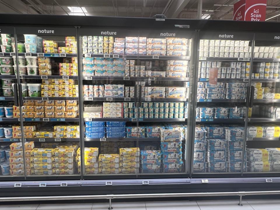 Aisle at Auchan full of yogurt