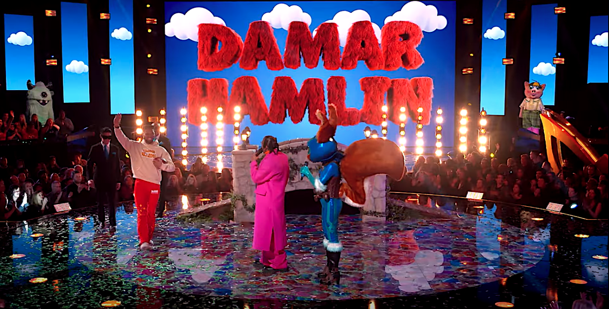 The crowd and judges go wild for Damar Hamlin's surprise 'The Masked Singer' Season 9 appearance, taping just weeks after his cardiac arrest. (Photos: Fox)