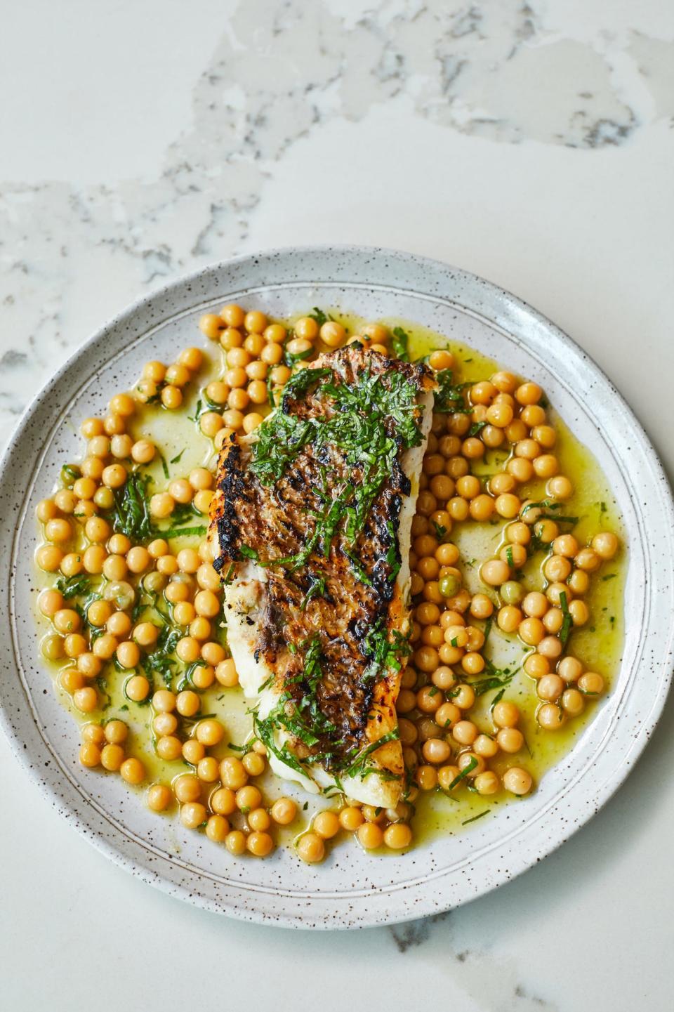 Grilled market fish, Austrian winter peas, herbs, lime, collard capers
