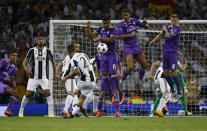 <p>Juventus’ Paulo Dybala takes a freekick </p>