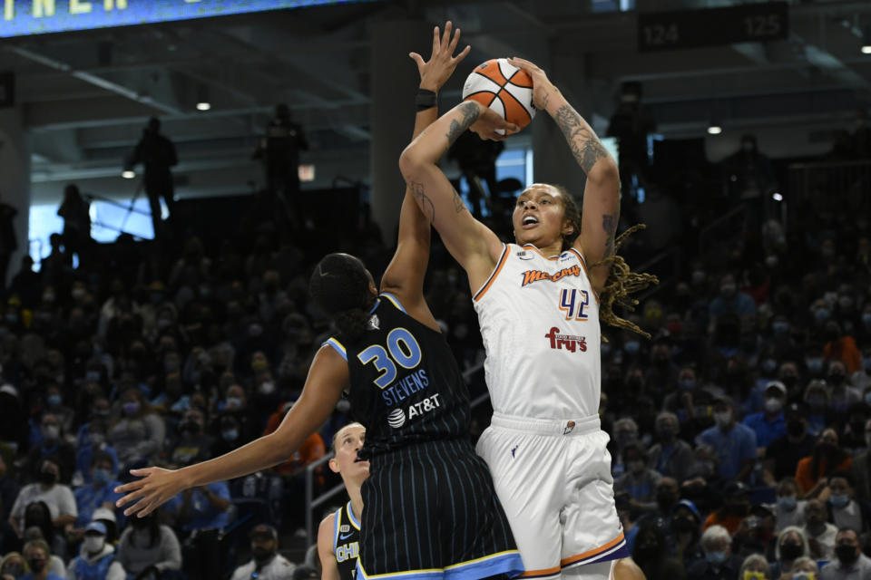 FILE - Phoenix Mercury's Brittney Griner (42) shoots against Chicago Sky's Azura Stevens (30) during the first half of Game 4 of the WNBA Finals, Sunday, Oct. 17, 2021, in Chicago. She hasn’t said if she’ll ever play basketball again. (AP Photo/Paul Beaty, File)