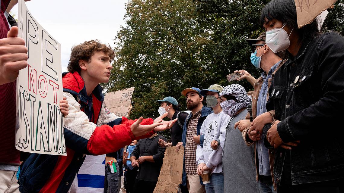 Counter-protesters and Pro-Palestine demonstrators interact during a rally in support of Palestinians at UNC-Chapel Hill on Thursday, Oct. 12, 2023. The rally was organized by the UNC chapter of Students for Justice in Palestine. Kaitlin McKeown/kmckeown@newsobserver.com