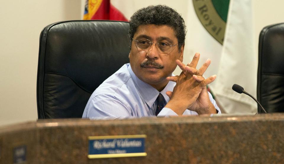 Royal Palm Beach Mayor Fred Pinto attends a village council meeting in Royal Palm Beach, Florida on November 16, 2017.