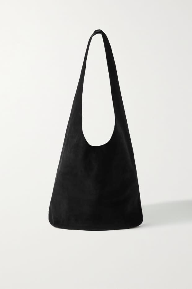 <p>The Row Bindle Three Suede Shoulder Bag, $1,690, <a href="https://rstyle.me/+qiX-1GXUPt6h0VsqE3KLFA" rel="nofollow noopener" target="_blank" data-ylk="slk:available here;elm:context_link;itc:0;sec:content-canvas" class="link ">available here</a>. </p>