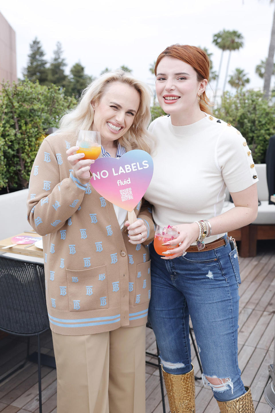 (L-R) Rebel Wilson, Fluid Co-Founder, and Bella Thorne attend the Fluid Launch Party and Mixology Hosted by Casamigos at Funke on June 15, 2023 in Los Angeles, California.