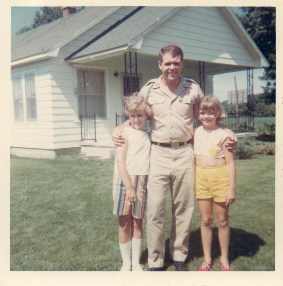 Dick Wolfe poses with his sister, Carolyn, and a friend.