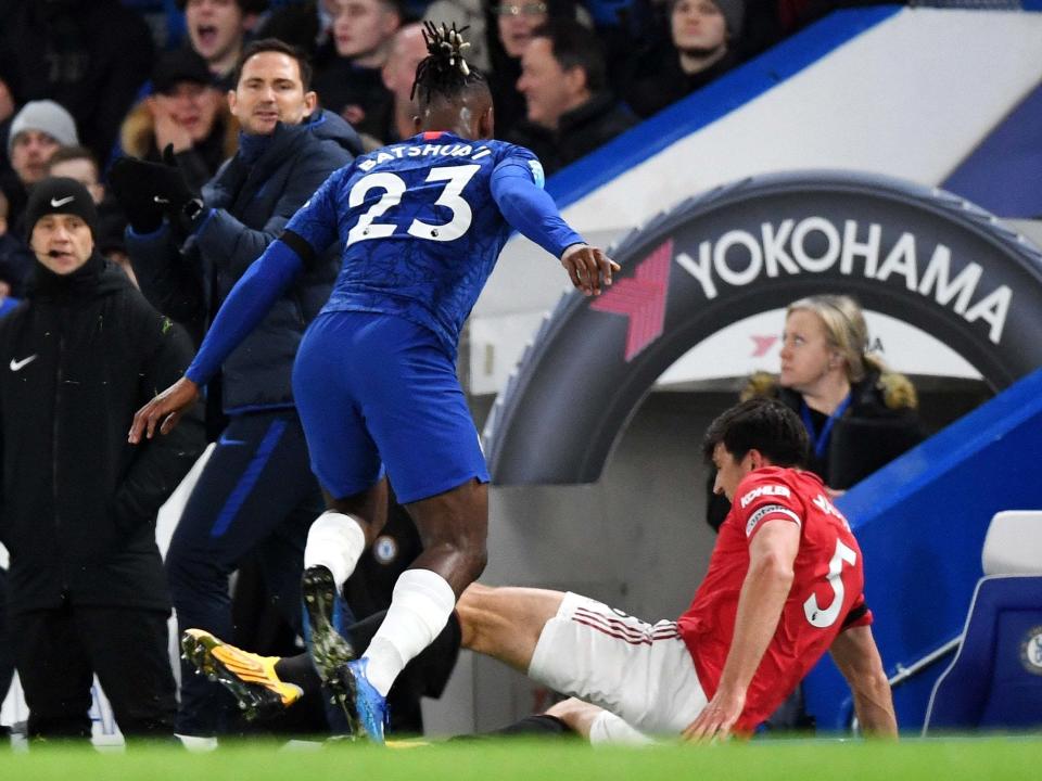 Harry Maguire is set to avoid retrospective action despite appearing to kick Chelsea striker Michy Batshuayi: EPA