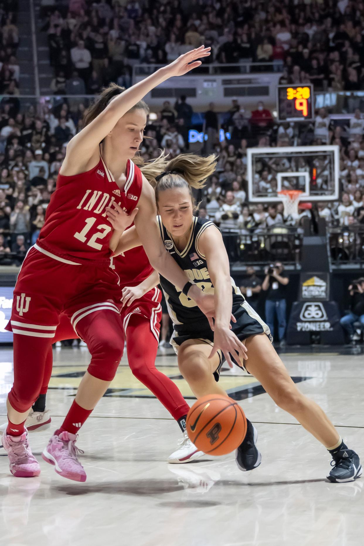 Purdue Boilermakers guard Abbey Ellis (23) takes contact on her way to the basket during the NCAA women’s basketball game against the Indiana Hoosiers, Sunday Jan. 21, 2024, at Mackey Arena in West Lafayette, Ind. Indiana won 74-68.