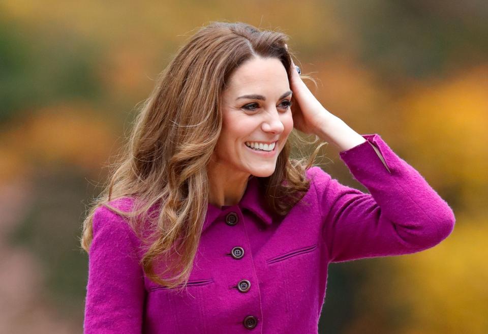 Kate Middleton out in a purple coat