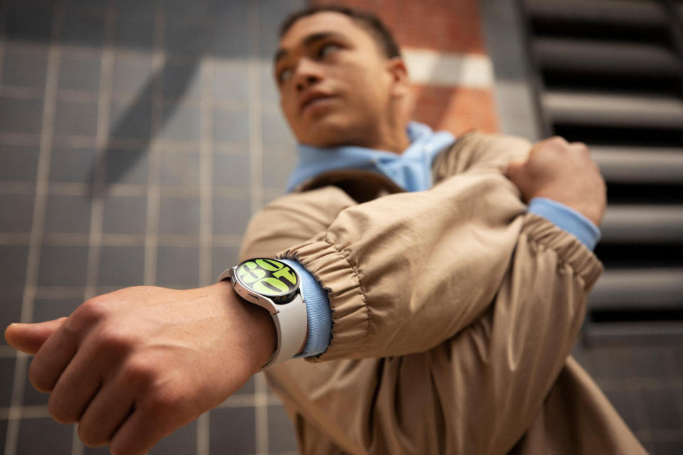 Samsung Galaxy Watch 6  on a man's wrist under a jacket