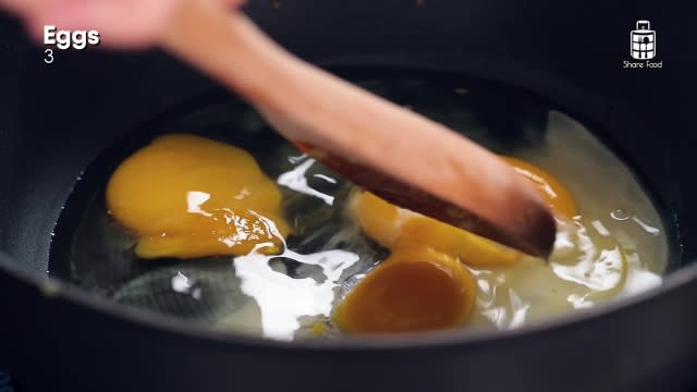 Three eggs in a pan