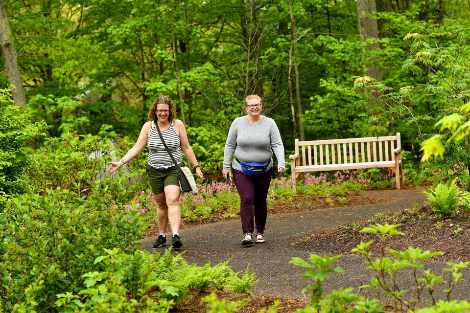 Jennifer Conners, left, and Gracia Casey, both of Northbridge, enjoy The Ramble at the New England Botanic Garden at Tower Hill in Boylston on Saturday.