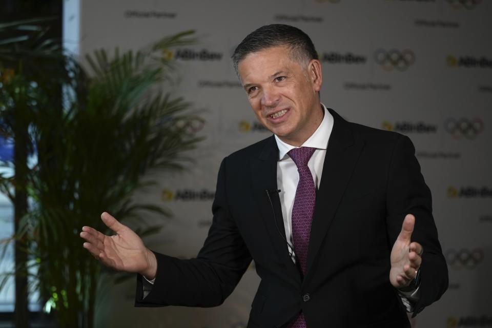 Anheuser-Busch InBev CEO Michel Doukeris speaks during an interview in London, Friday, Jan. 12, 2024. The International Olympic Committee has signed Anheuser-Busch InBev as the first beer brand in the 40-year history of its sponsorship program, which earns billions of dollars for the organization and international sports. (AP Photo/Kin Cheung)