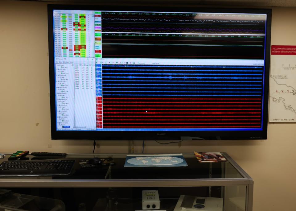 A TV at the YKA displays readings from the surrounding seismometers. The readings  are transmitted to Ottawa by Ethernet radios.