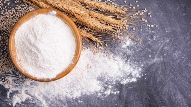 Bowl of flour with wheat and flour