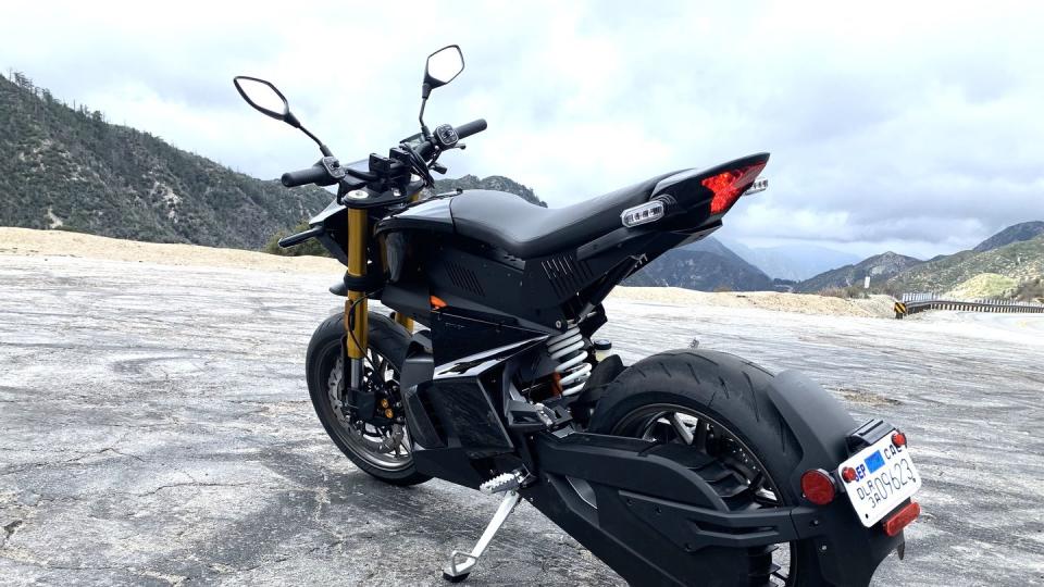 a motorcycle parked on a beach