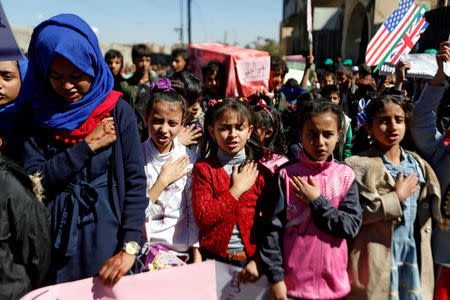 Children chant the Yemeni national anthem during a protest against the Saudi-led coalition outside the U.N. offices in Sanaa, Yemen November 20, 2017. REUTERS/Khaled Abdullah