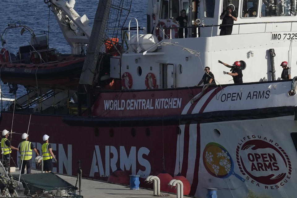 FILE - A ship belonging to the Open Arms aid group and is one of three ships loaded with canned food destined to Gaza, has returned to the Cypriot port of Larnaca, Cyprus, Wednesday, April 3, 2024. World Central Kitchen and a few other aid groups suspended operations in Gaza, after seven aid workers were killed by airstrikes. Yet despite the danger, many of the largest organizations barely slowed down. Hunger has become commonplace in Gaza amid the war with Israel, and U.N. officials warn that famine is increasingly likely in northern Gaza. (AP Photo/Petros Karadjias, File)