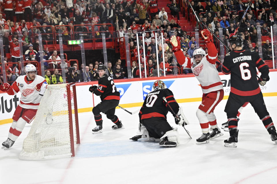 Detroit Red Wings David Perron, second from right, celebrates after scoring during the NHL Global Series Sweden ice hockey match between Detroit Red Wings and Ottawa Senators at Avicii Arena in Stockholm, Sweden, Thursday, Nov. 16, 2023. (Henrik Montgomery/TT News Agency via AP)