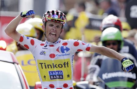 Tinkoff-Saxo team rider Ral Majka of Poland reacts as he crosses the finish line to win the 124.5km seventeenth stage of the Tour de France cycle race between Saint-Gaudens and Saint-Lary Pla d'Adet, July 23, 2014. REUTERS/Jacky Naegelen (FRANCE - Tags: SPORT CYCLING)