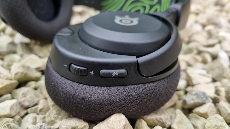 The left earcup controls on the SteelSeries Arctis Nova 5X Wireless