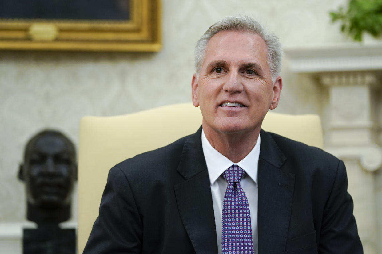 House Speaker Kevin McCarthy of Calif., listens as he meets with President Joe Biden to discuss the debt limit in the Oval Office of the White House, Monday, May 22, 2023, in Washington. (AP Photo/Alex Brandon)