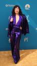 <p> Sparkling in purple, the Grey's Anatomy actress's raven-coloured tresses perfectly complemented her bold, bright outfit. </p> <p> Sandra seemed to be channelling the 70s from head to toe. With wide-legged flares and a satin shirt with a plunging neckline plus her loose, glam-rock curls Sandra looks like she could be on the dancefloor at Studio 54. </p>