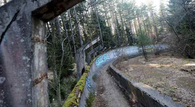 Sarajevo's abandoned bob sleigh track was heavily damaged during Bosnia's 1992-95 war. It was never rebuilt and its large concrete fragments remain standing as a memento of past and training ground for young generations of graffiti artists. Photo: Getty Images