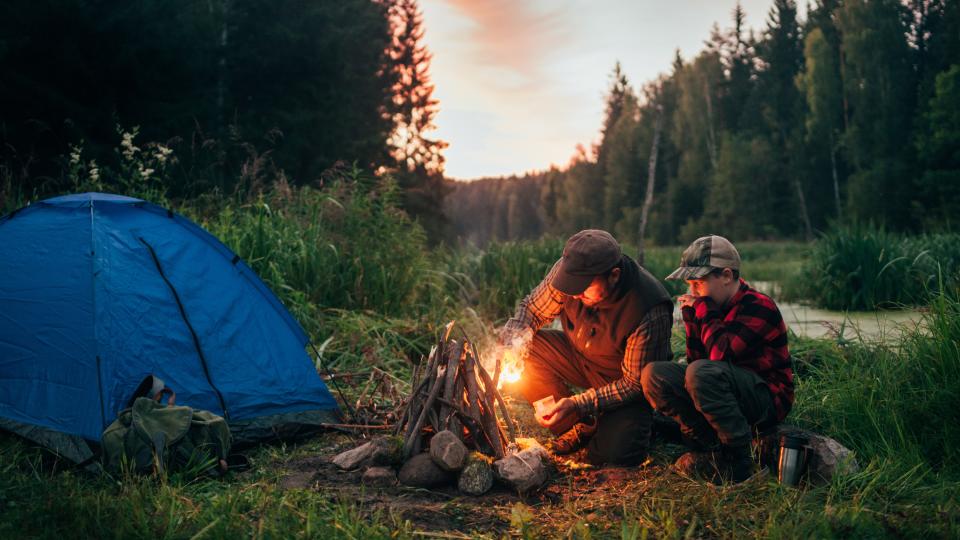 Father and son camping together