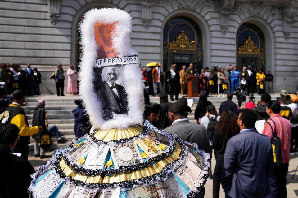 A rally in support of reparations for African Americans outside City Hall in San Francisco on Sept. 19, 2023. (Eric Risberg / AP)