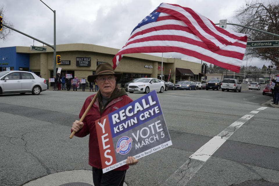 John Deaton joins others in a demonstration calling for the recall of Shasta County First District Supervisor Kevin Crye during a rally in Redding, Calif., on Tuesday, Feb. 20, 2024. Crye is one of the board members who voted to get rid of the county's ballot-counting machines in favor of counting ballots by hand .(AP Photo/Rich Pedroncelli)