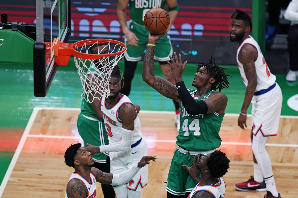 Boston Celtics center Robert Williams III (44) shoots against the New York Knicks during the first half of an NBA basketball game Wednesday, April 7, 2021, in Boston. (AP Photo/Charles Krupa)
