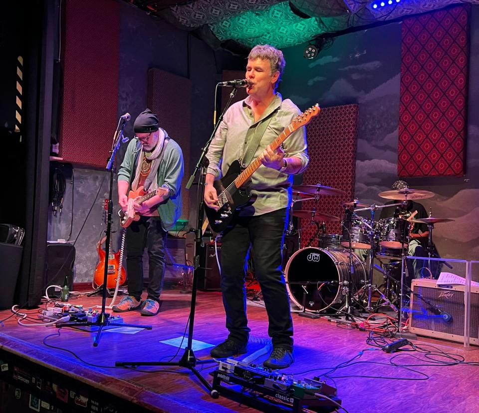 Brian Lisik of Perry Township, shown performing with his band Hard Legs recently at the Rialto Theatre in Akron, will be in concert on Thursday night at the Music for Maui benefit at Lions Lincoln Theatre in downtown Massillon.