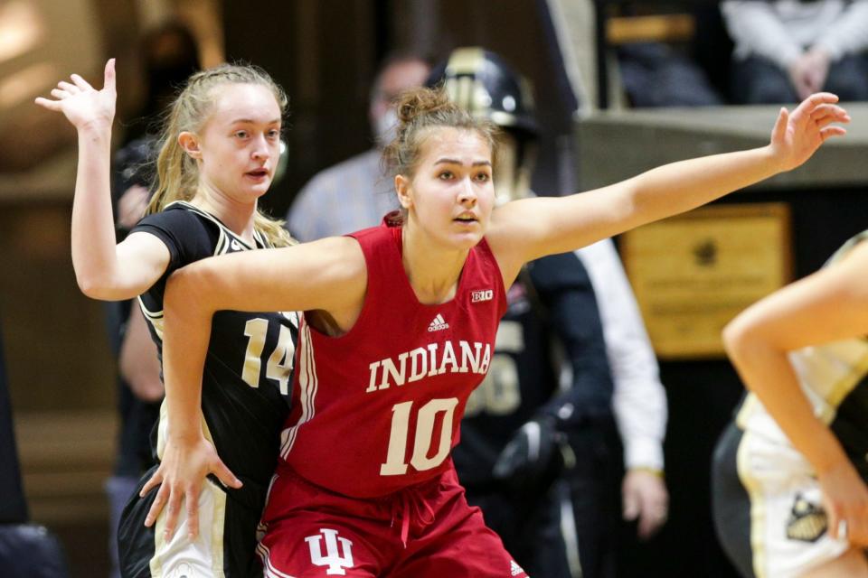 Indiana forward Aleksa Gulbe (10) boxes out Purdue guard Ava Learn (14) during the first quarter of an NCAA women's basketball game, Sunday, Jan. 16, 2022 at Mackey Arena in West Lafayette.