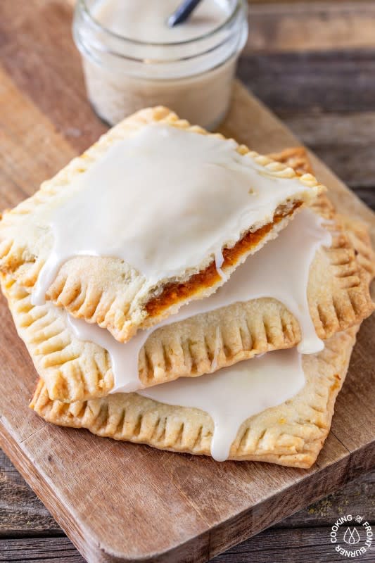 <p>Cooking on The Front Burners</p><p>These homemade pumpkin pie pop tarts are a delicious breakfast or dessert treat! The flaky crust is stuffed with a creamy pumpkin filling and topped with a maple glaze. </p><p><strong>Get the recipe: <em><a href="https://www.cookingonthefrontburners.com/pumpkin-pie-pop-tarts/" rel="nofollow noopener" target="_blank" data-ylk="slk:Pumpkin Pie Pop Tarts;elm:context_link;itc:0;sec:content-canvas" class="link ">Pumpkin Pie Pop Tarts</a></em></strong></p>