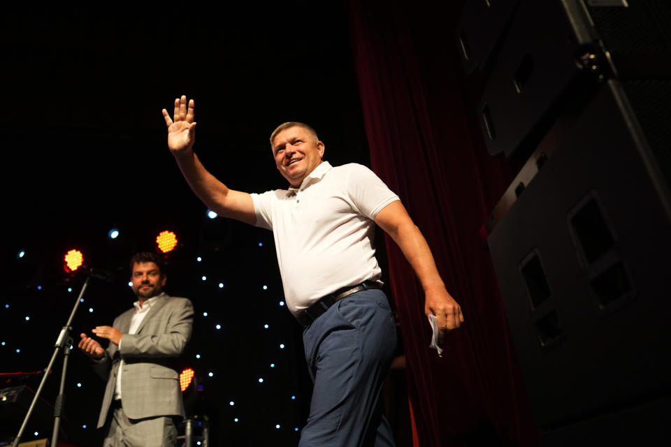 FILE - Former Slovak Prime Minister and head of leftist SMER - Social Democracy party Robert Fico waves to his supporters during an election rally in Michalovce, Slovakia, on Sept. 6, 2023. Slovakia holds early parliamentary elections on Saturday Oct. 30, 2023, with Fico and his scandal-tainted party favored to win after campaigning on a clear pro-Russian and anti-American message. (AP Photo/Petr David Josek, File)