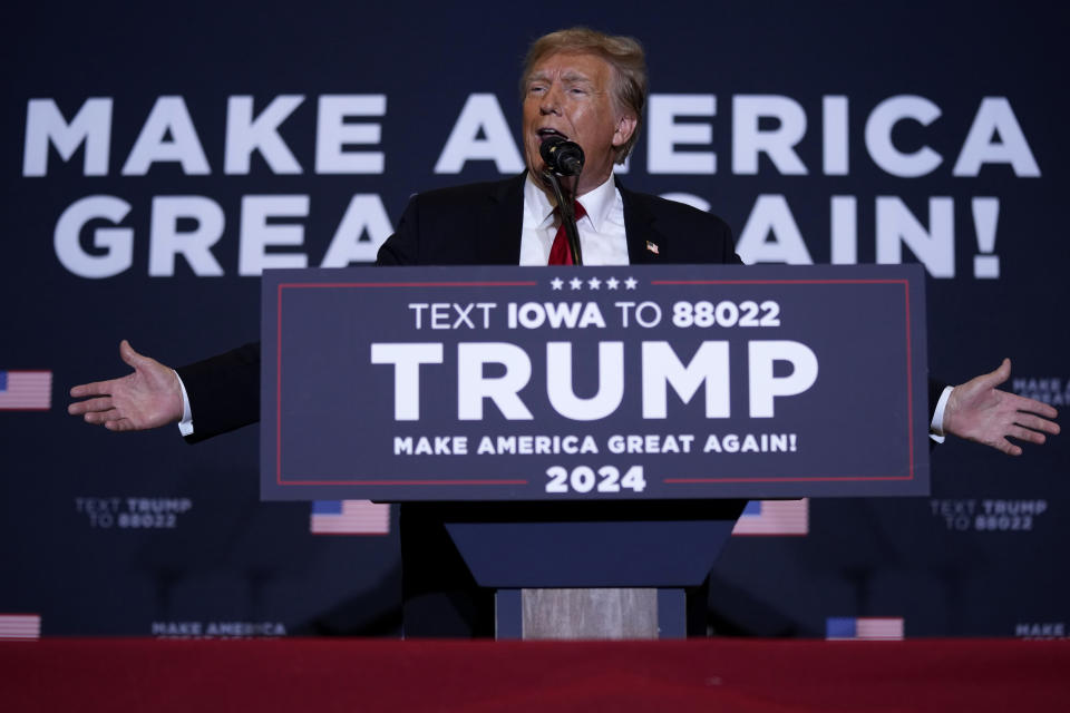 FILE - Former President Donald Trump speaks during a commit to caucus rally, Wednesday, Dec. 13, 2023, in Coralville, Iowa. Trump is pushing his supporters to deliver a blowout win in the Iowa caucuses one month away. Unlike his first time in the caucuses, Trump’s campaign is now run by Iowa veterans who are not just locking in caucus commitments but building a formidable organization to try to lock in his lead. (AP Photo/Charlie Neibergall, File)