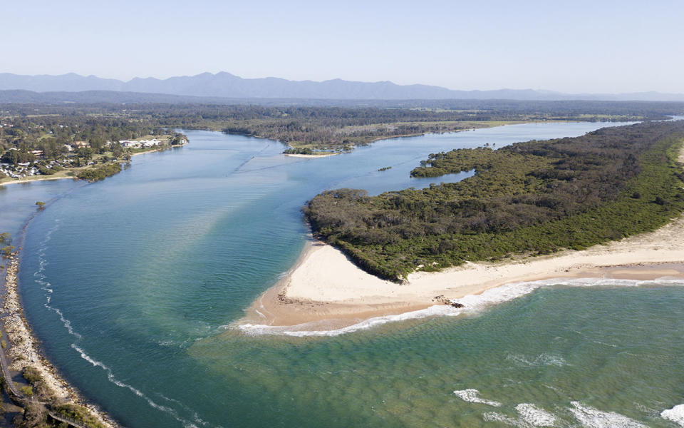 A father has died while trying to rescue his teenage son at Urunga beach in NSW. Source: Getty Images