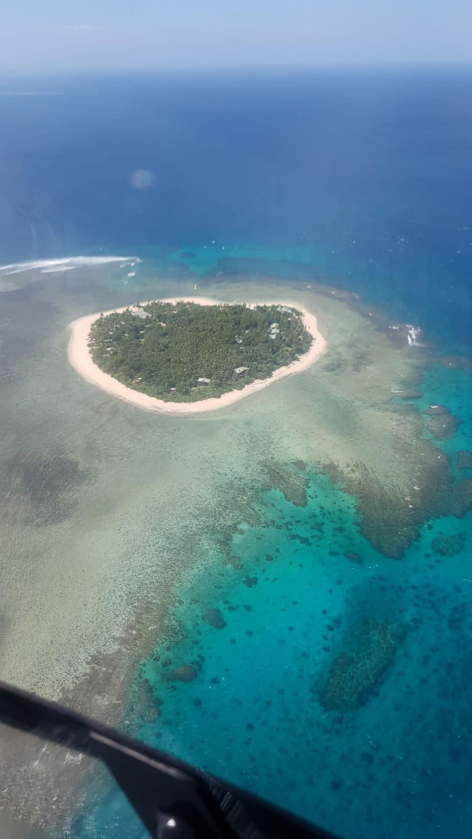 The 35-minute flight took in the famous ‘love heart island’ island of Tavarua. Photo: Be